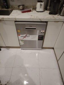 تعديل الغسالة بدولاب المطبخ